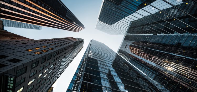 Looking up at skyscrapers